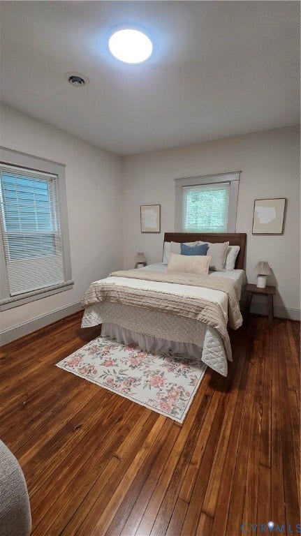 2317 5th Avenue, Richmond, VA 23222 Wood flooring throughout, recessed ceiling light, window with blinds, and white trim