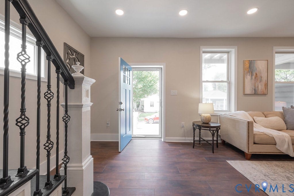 Wood flooring throughout the living space