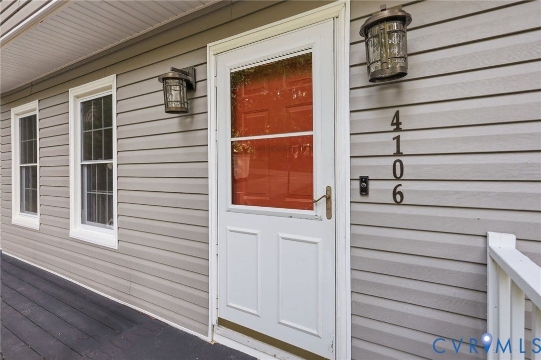 4106 Gloucestershire Street, North Chesterfield, VA 23236 Gray horizontal siding with white trim