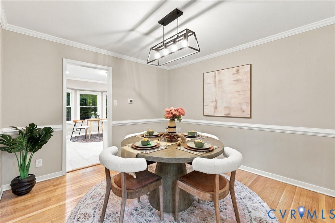 4106 Gloucestershire Street, North Chesterfield, VA 23236 Hardwood flooring, crown molding, chair rail molding, and a contemporary chandelier