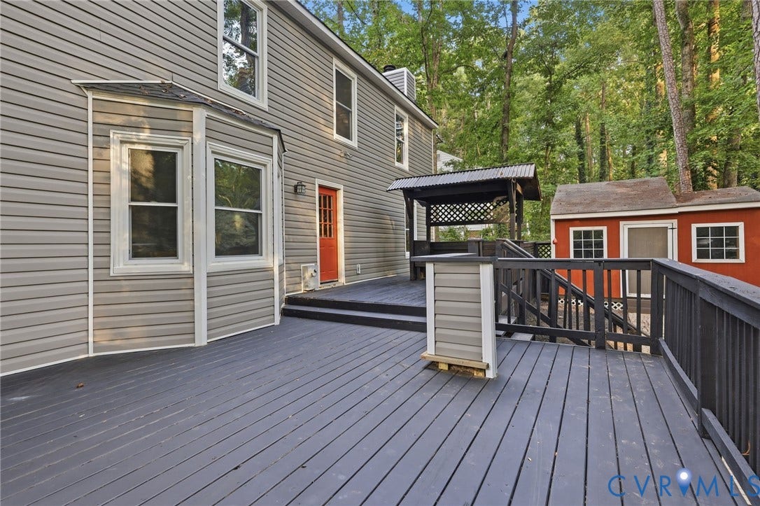 4106 Gloucestershire Street, North Chesterfield, VA 23236 Expansive wood deck with dark finish, covered gazebo, and bay window