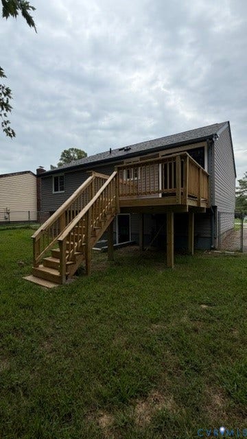 Raised wooden deck with staircase access