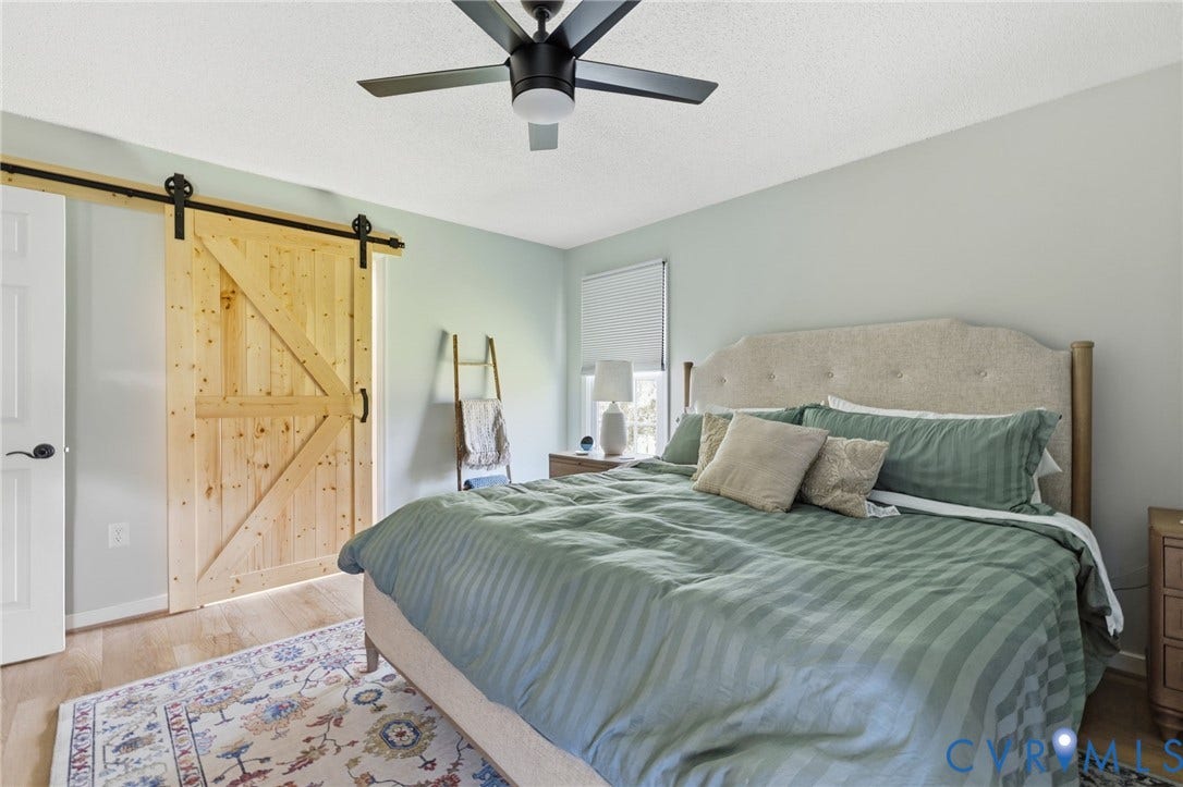 10744 Brookley Road, Glen Allen, VA 23060 Wood-finish flooring with a barn door entry