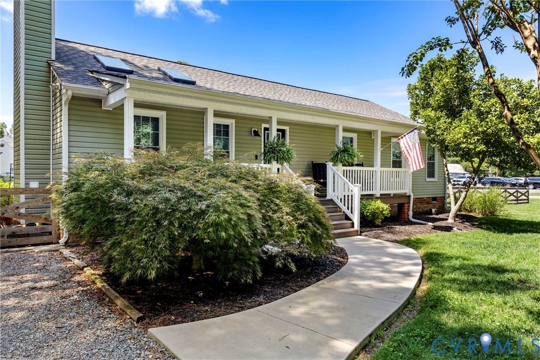 10744 Brookley Road, Glen Allen, VA 23060 Siding exterior with a covered porch, white railings, and a concrete walkway