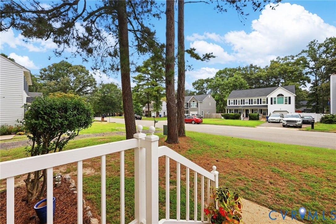 2807 Executive Drive, John Tyler Woods, Chesterfield, VA 23831 Manicured front yard with mature trees, established landscaping, and white porch railing
