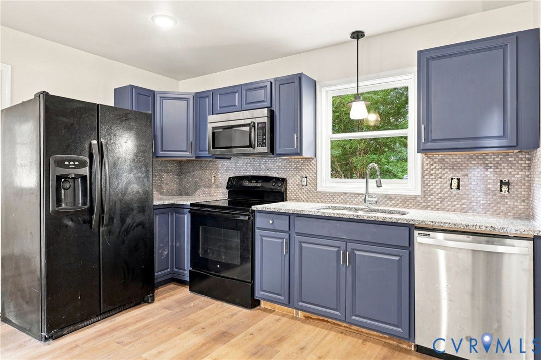 2807 Executive Drive, John Tyler Woods, Chesterfield, VA 23831 Kitchen featuring wood-finish flooring, blue cabinetry, granite countertops, a tiled backsplash, and stainless steel dishwasher
