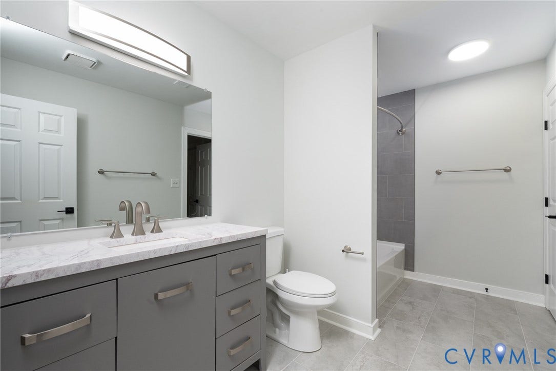 5605 Beacon Hill Drive, Beacon Hill, Midlothian, VA 23112 Stunning bathroom renovation with new vanity, quartz, tile floor and tile tub surround