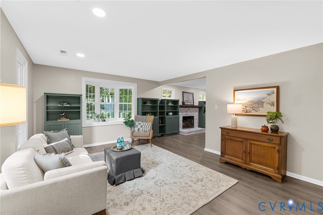 4906 Court Ridge Terrace, Brandermill, Midlothian, VA 23112 Recessed ceiling lighting, wood-finish flooring, built-in shelving, bay window, and a brick fireplace
