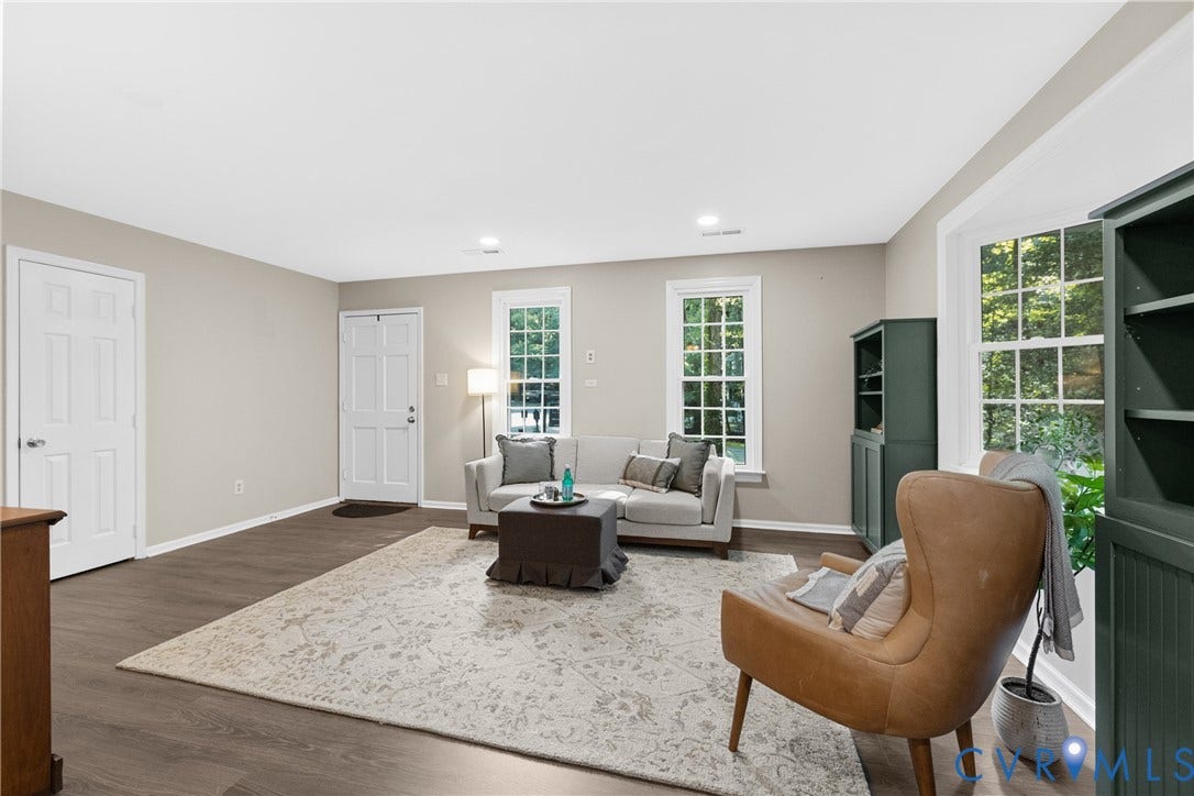 4906 Court Ridge Terrace, Brandermill, Midlothian, VA 23112 Open living space with wood-finish flooring, recessed lighting, and multiple windows