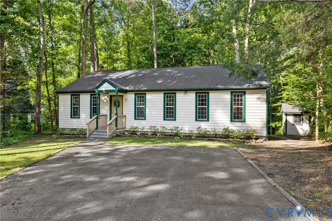 4906 Court Ridge Terrace, Brandermill, Midlothian, VA 23112 White siding exterior with a dark roof and green trim