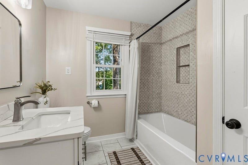 2016 Wrens Nest Road, Settlers Landing, Richmond, VA 23235 White vanity with a rectangular sink and marble-patterned countertop