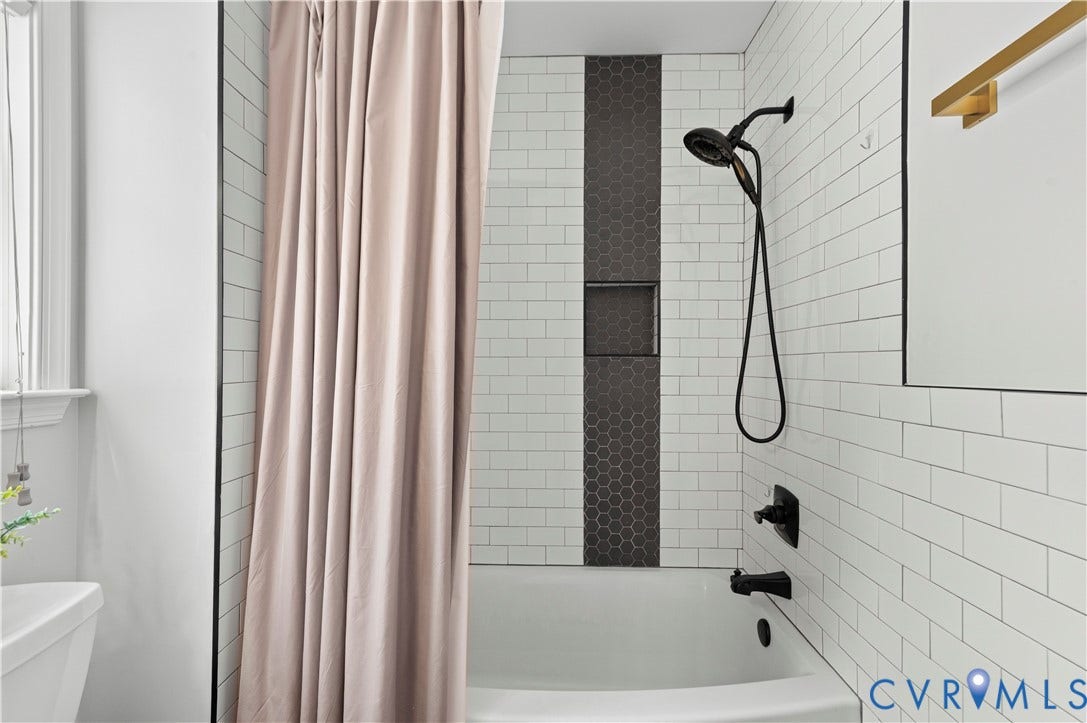 Second floor hall bath shower.