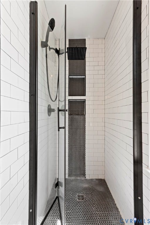 Spa like rain shower with folding shower door.