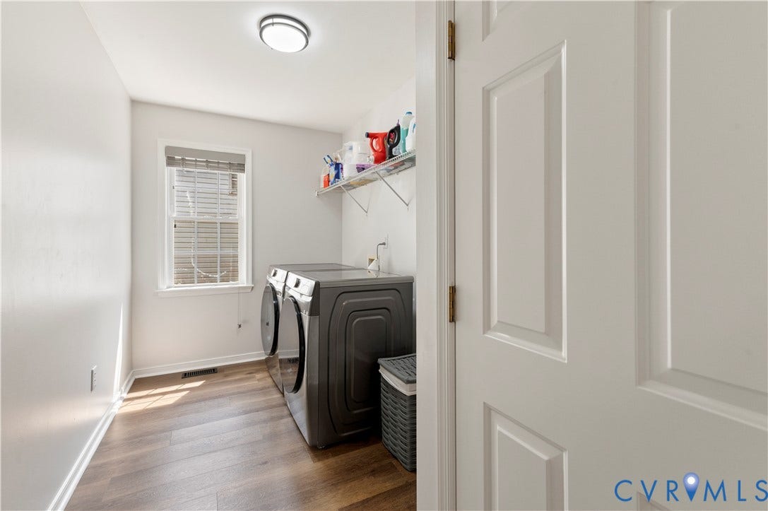 First floor utility room with a closet and access to the garage.