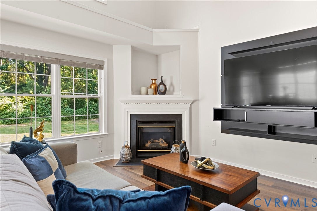 Gas fireplace and private backyard.