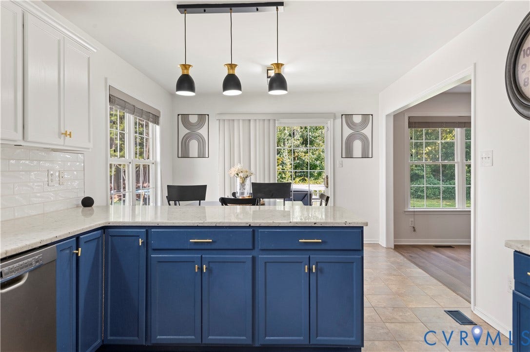 Beautiful kitchen with new fixtures and granite countertops.
