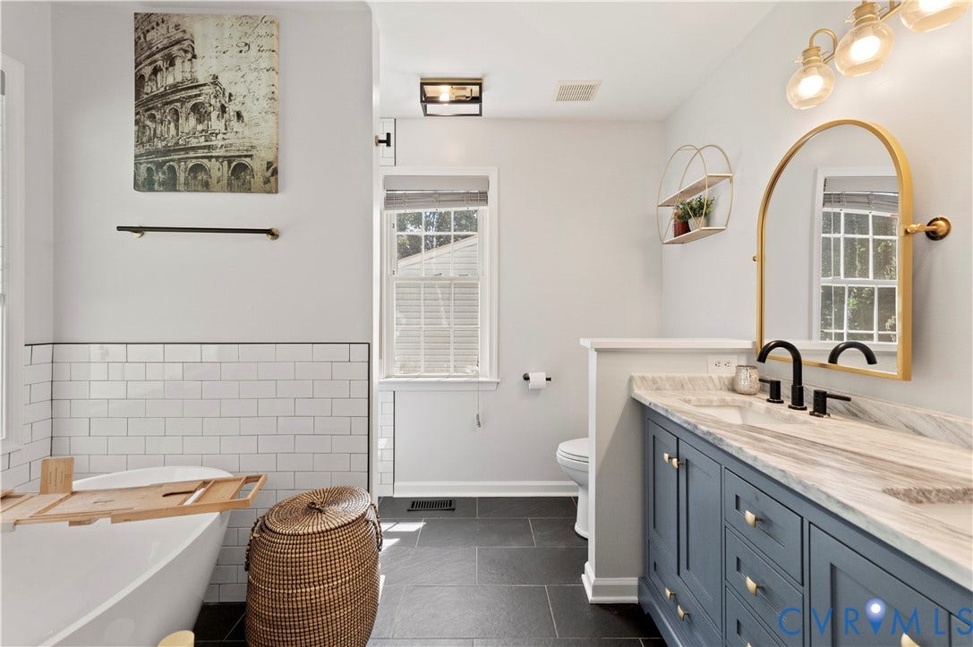 Double vanities and new fixtures in the owners bath.