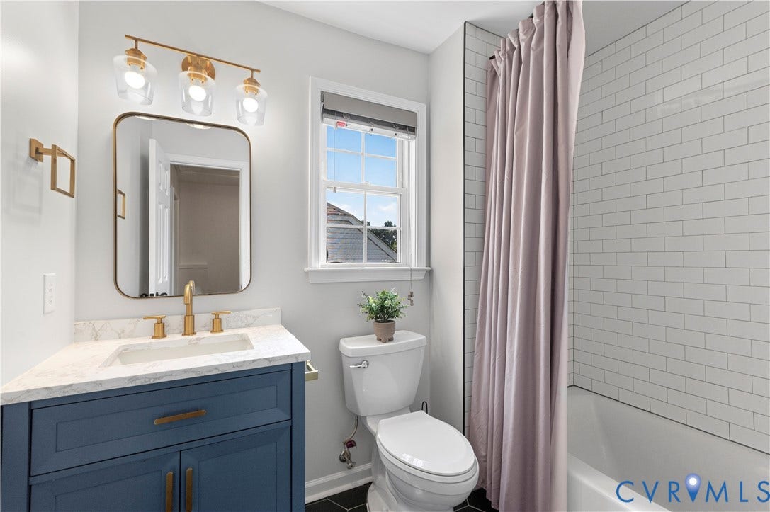 Second floor updated hall bath.