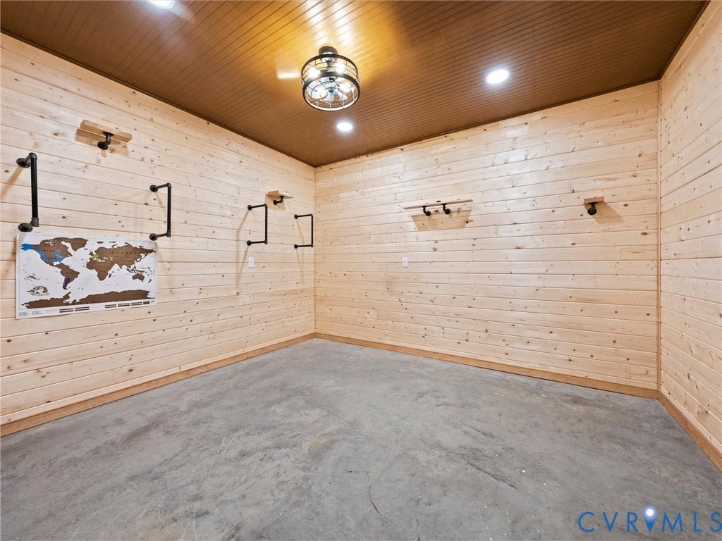6126 Cartersville Road, Powhatan, VA 23139 Light wood-paneled walls with recessed lighting and a central ceiling fixture