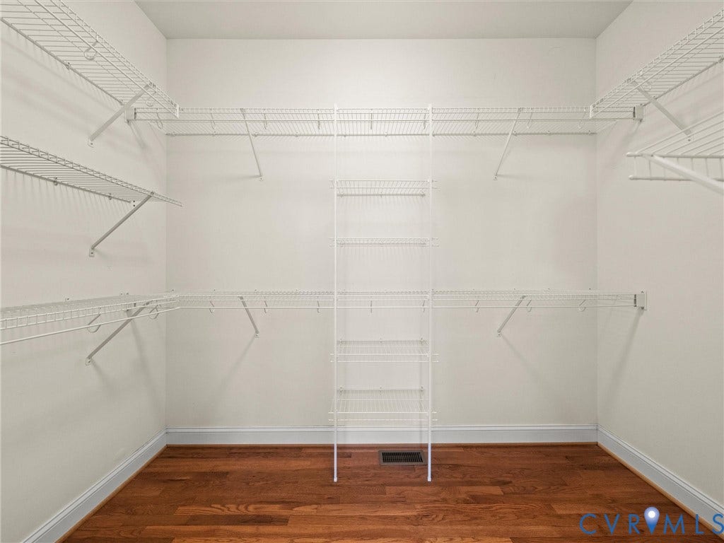 6126 Cartersville Road, Powhatan, VA 23139 Integrated wire shelving system, white wall paint, hardwood flooring, white baseboards