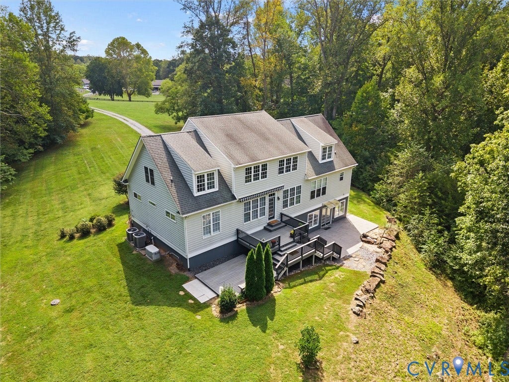 6126 Cartersville Road, Powhatan, VA 23139 Expansive rear deck featuring multiple levels and a stone patio