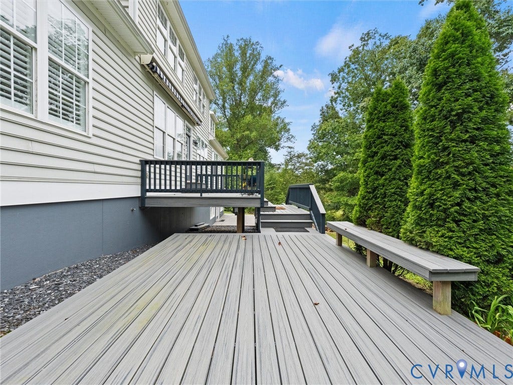 6126 Cartersville Road, Powhatan, VA 23139 Multi-level decking with built-in seating, privacy landscaping, and a direct entrance to the residence