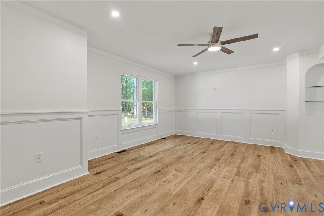 6465 Anderson Highway, Powhatan, VA 23139 Wood-finish flooring with white wainscoting and crown molding