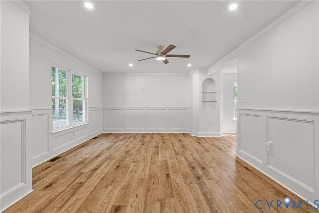6465 Anderson Highway, Powhatan, VA 23139 Wood-finish flooring with white wainscoting and crown molding