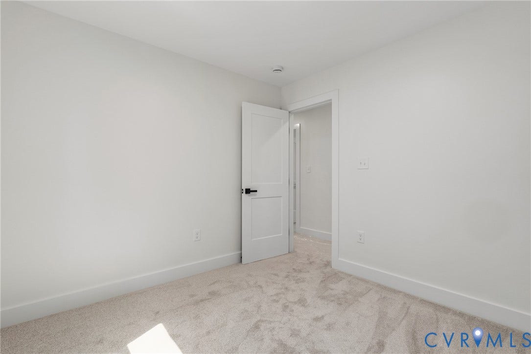 6465 Anderson Highway, Powhatan, VA 23139 Plush carpeting, crisp white walls, and a recessed ceiling light
