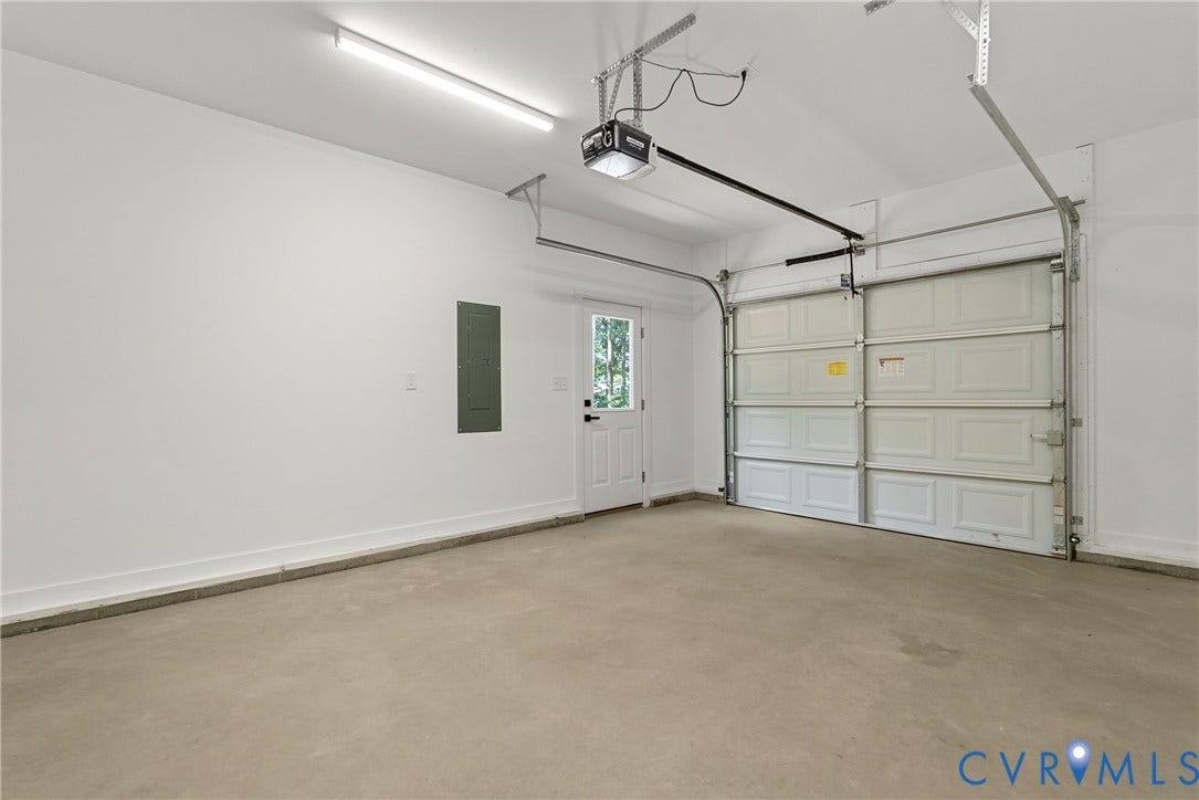 6465 Anderson Highway, Powhatan, VA 23139 Concrete flooring and white painted walls