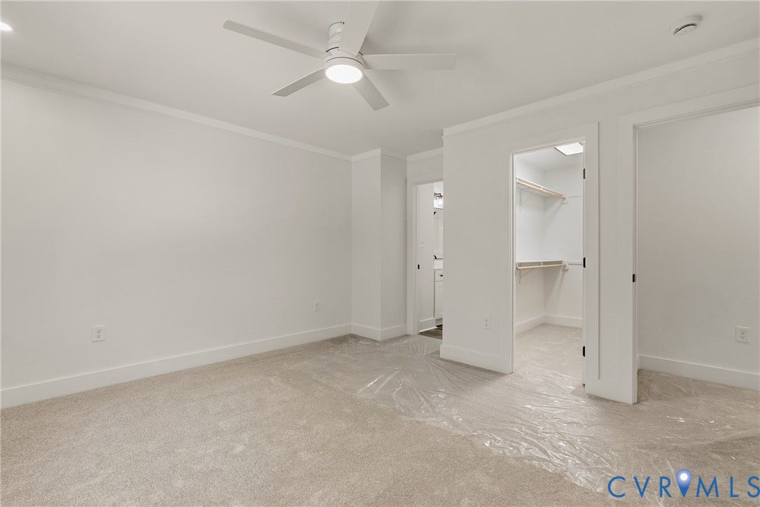 6465 Anderson Highway, Powhatan, VA 23139 Neutral paint colors, white trim, recessed lighting, ceiling fan, and carpeted flooring