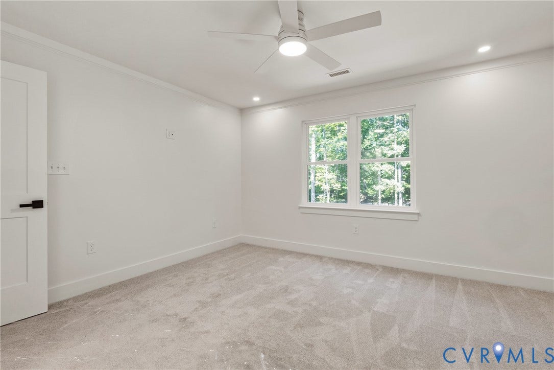 6465 Anderson Highway, Powhatan, VA 23139 Neutral-toned carpeting, crown molding, and recessed lighting