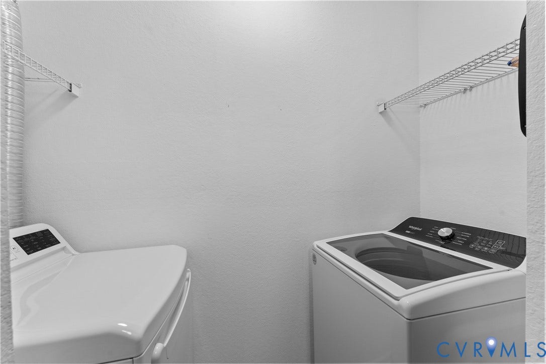 821 Brassie Lane, #E, The Crossings Golf Course Area, Glen Allen, VA 23059 Laundry area featuring dual white wall-mounted wire shelving units and top-loading laundry appliances