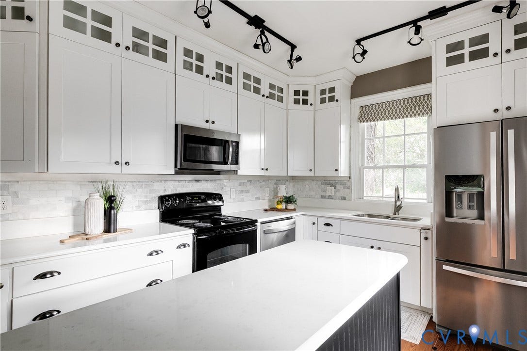 2216 E Marshall Street, Church Hill North, Richmond, VA 23223 White shaker cabinetry with square glass-front accents