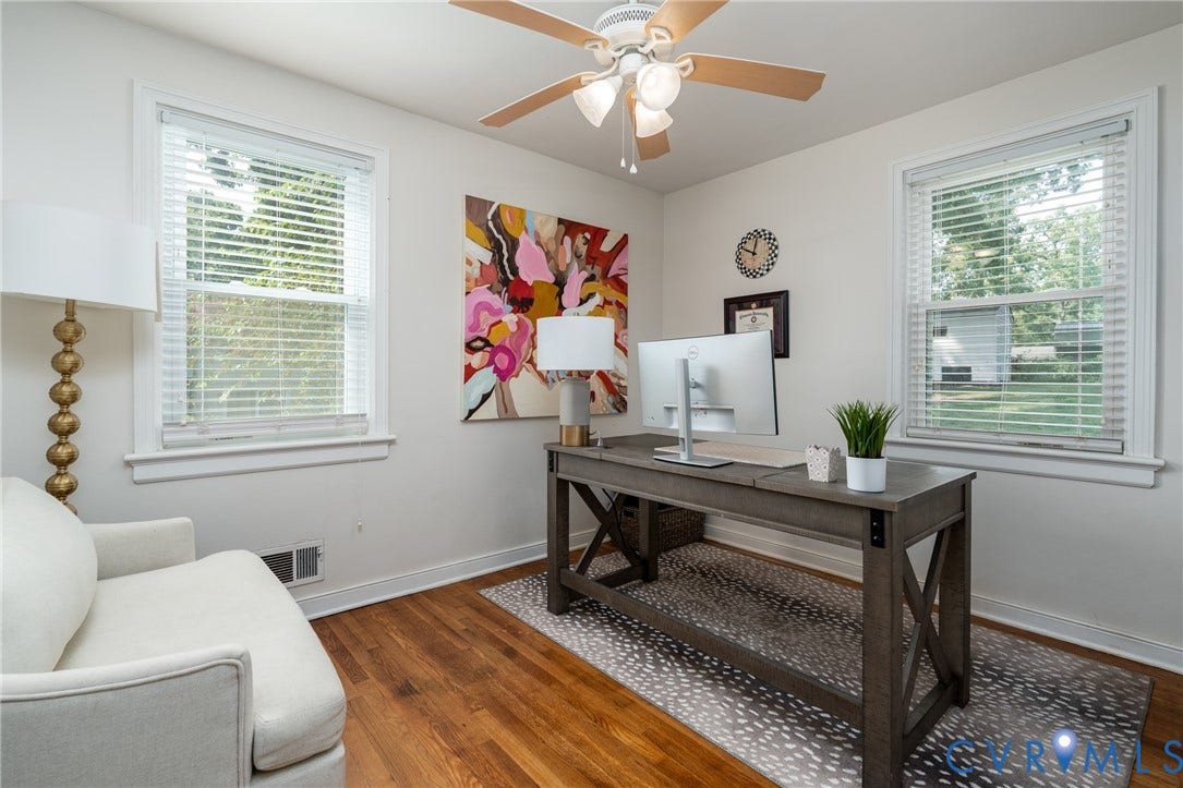 1204 Maywood Road, Beverly Hills, Henrico, VA 23229 Hardwood flooring, painted walls, ceiling fan with integrated lighting, and two windows with blinds