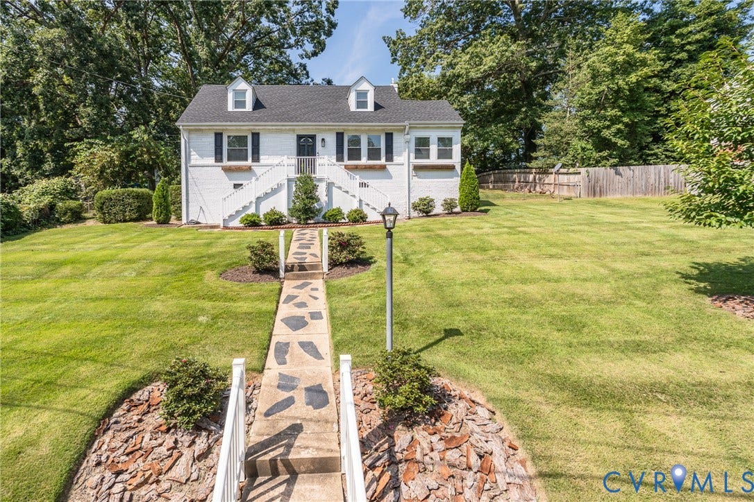 1204 Maywood Road, Beverly Hills, Henrico, VA 23229 White brick exterior with a dark roof and dormer windows
