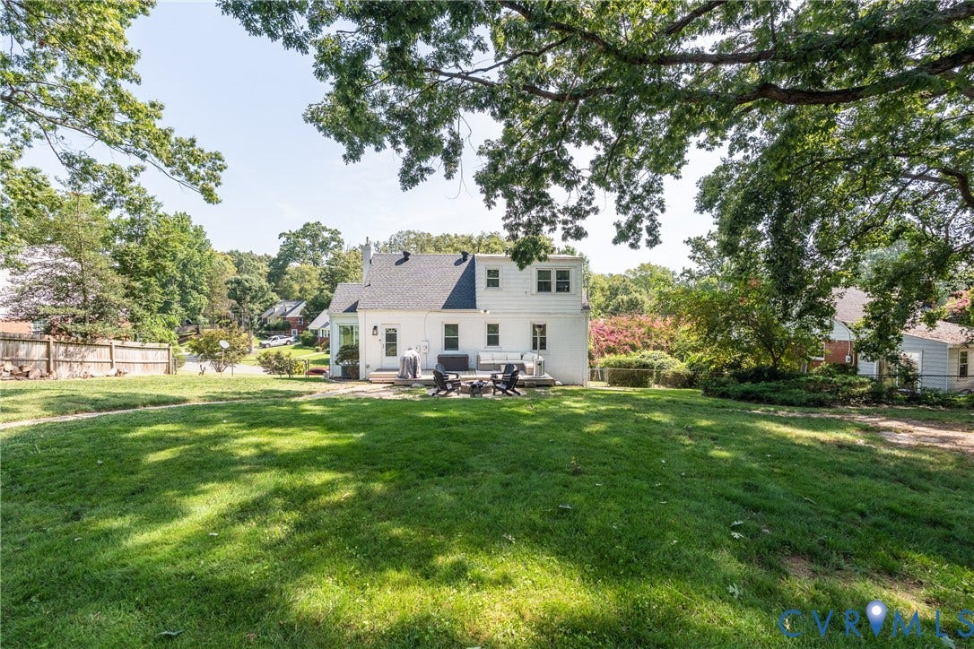 1204 Maywood Road, Beverly Hills, Henrico, VA 23229 Expansive grassy yard with mature trees and a fenced perimeter