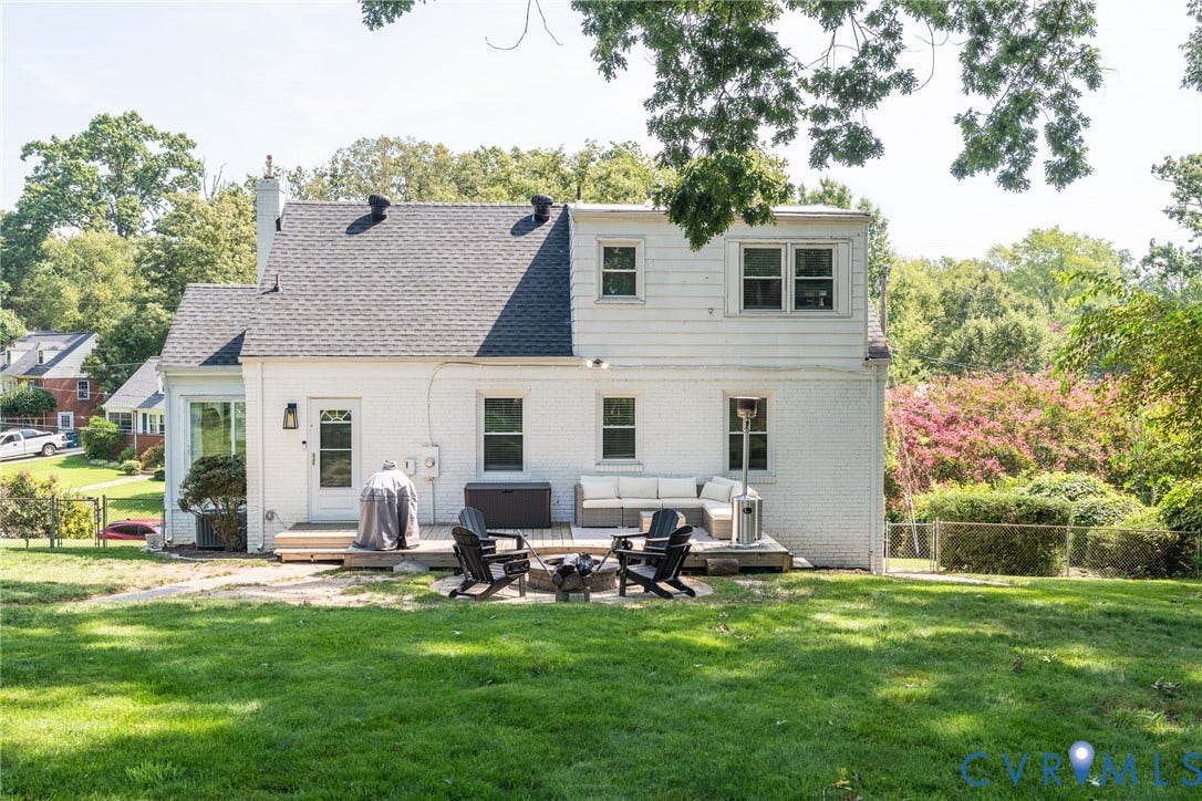 1204 Maywood Road, Beverly Hills, Henrico, VA 23229 Expansive rear yard with a manicured lawn, an outdoor deck, and a fire pit area