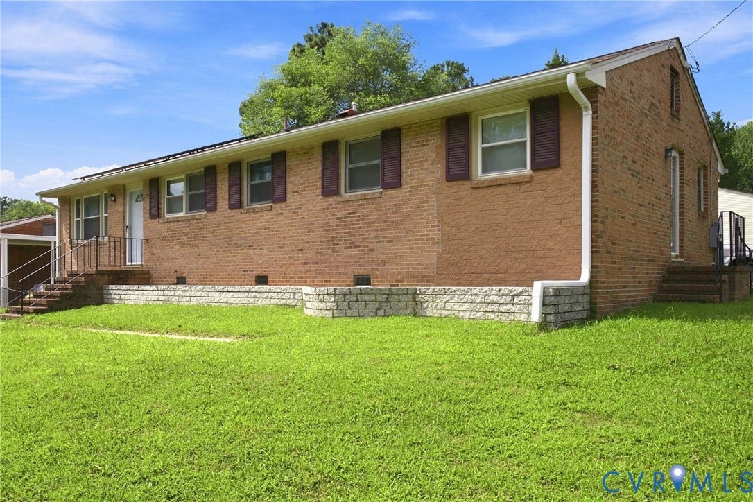1721 S Halcun Drive, Petersburg, VA 23803 Brick exterior with white trim