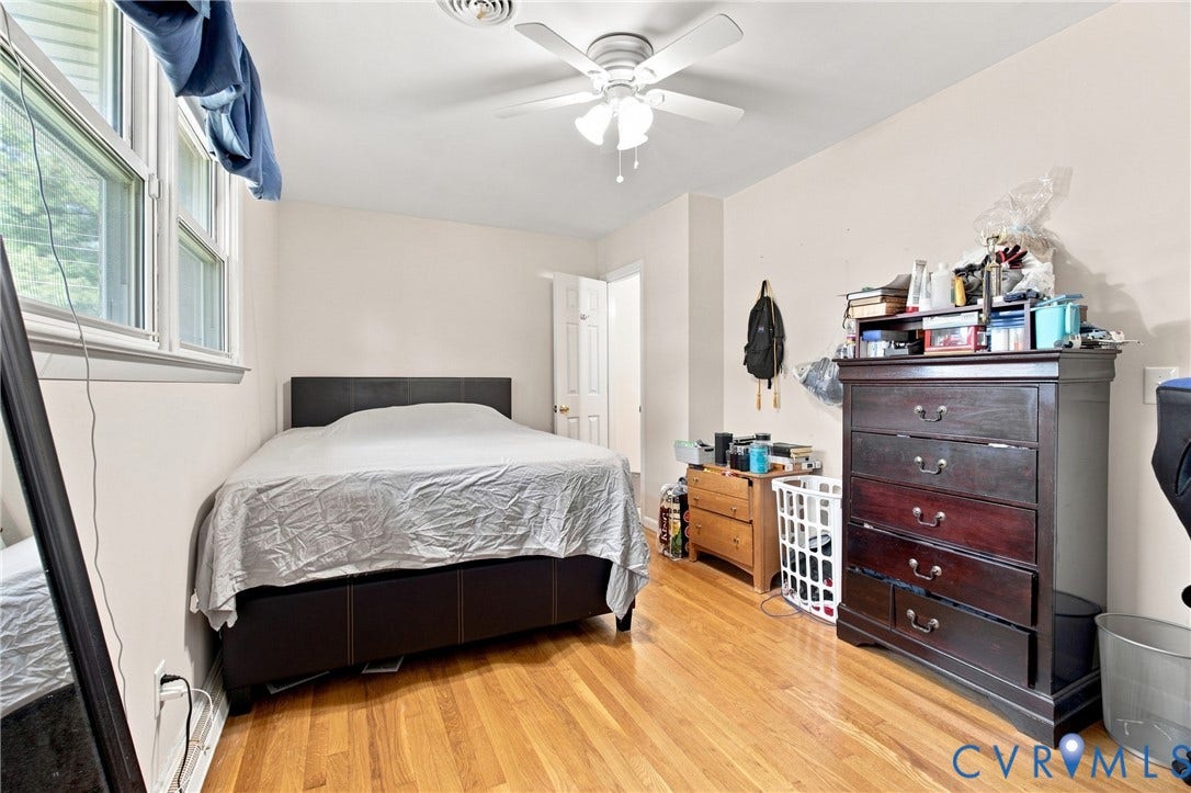 1721 S Halcun Drive, Petersburg, VA 23803 Wood-finish flooring with a ceiling fan and overhead lighting