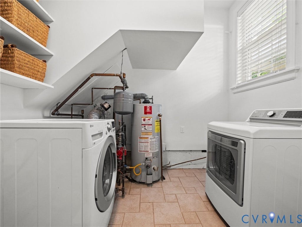 Tiled flooring with white walls and built-in shelving