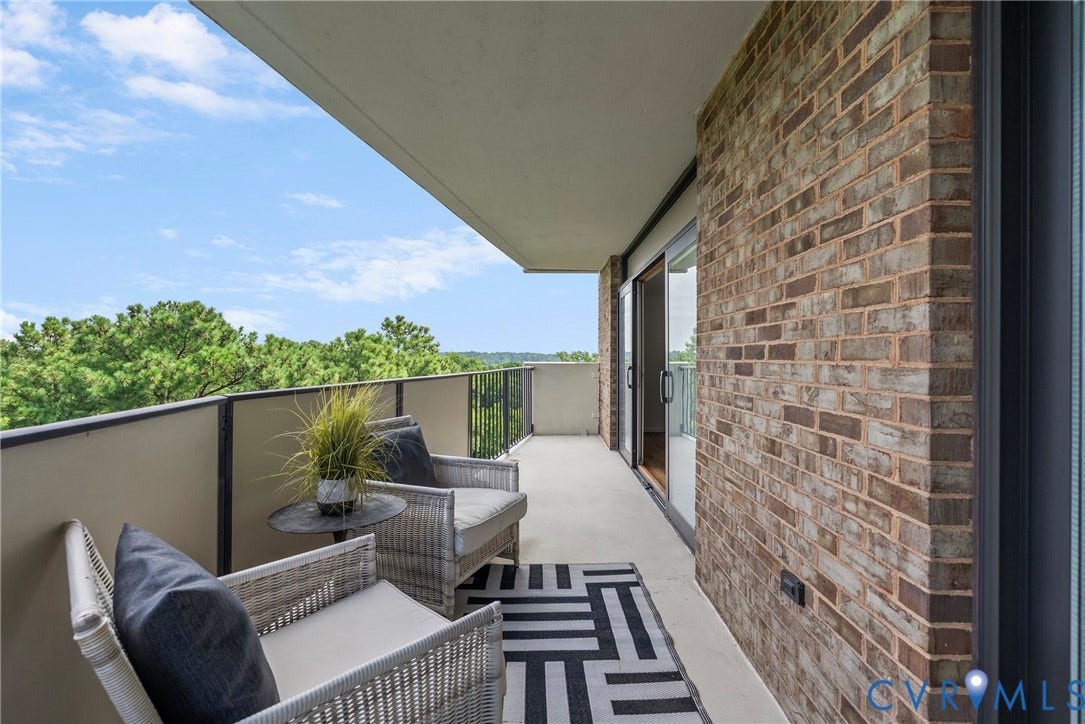 Corner unit with expansive, private balcony, access from multiple rooms in the home