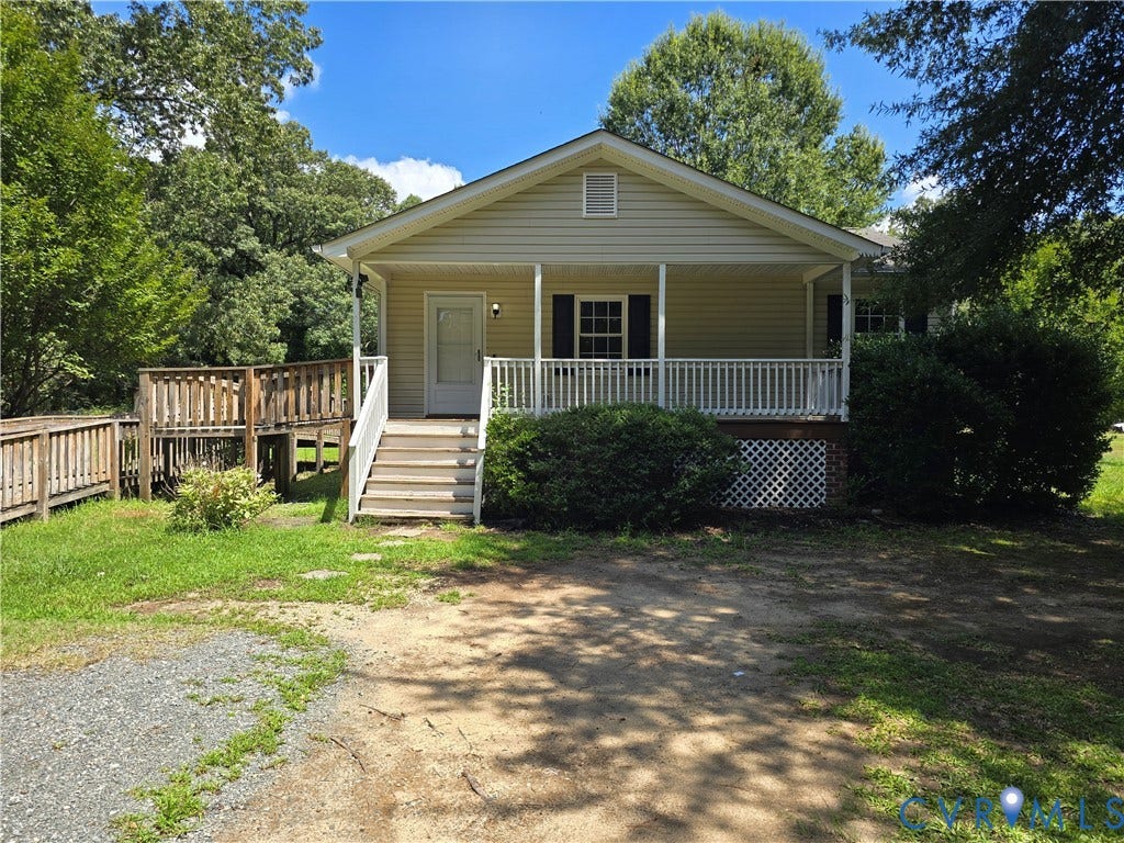 1019 Arizona Drive, Woodhaven, Richmond, VA 23224 Siding exterior with a covered porch, white railings, and a wooden ramp