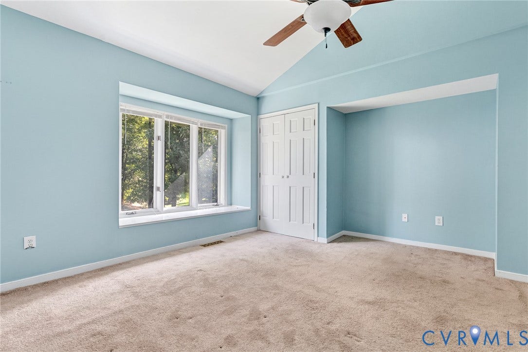 2807 Harbour Court, #2807, Henrico, VA 23233 Vaulted ceiling with a ceiling fan, bay window with a sill, and double bi-fold closet doors
