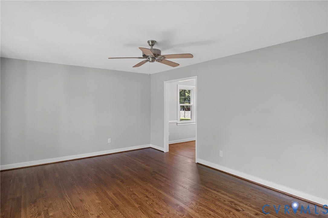 2317 Pleasant Run Drive, Henrico, VA 23238 Hardwood flooring throughout, neutral wall tones, and an overhead ceiling fan