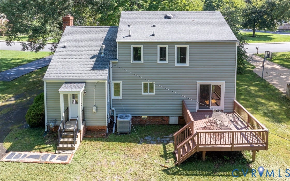 2317 Pleasant Run Drive, Henrico, VA 23238 Light gray siding exterior with a multi-level composite deck