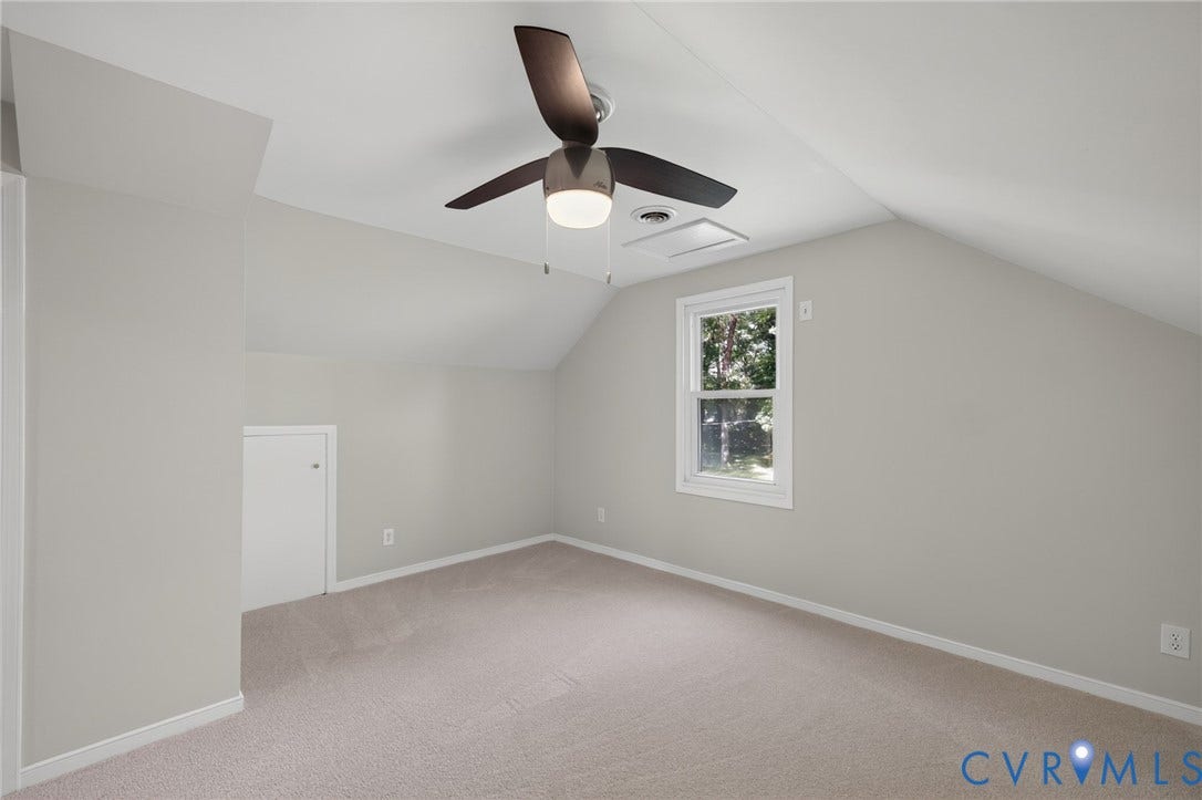 2317 Pleasant Run Drive, Henrico, VA 23238 Carpeted room with vaulted ceilings, a window, and a ceiling fan