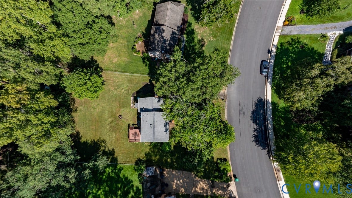 2317 Pleasant Run Drive, Henrico, VA 23238 Expansive lot with mature trees, a private backyard, and a wooden deck