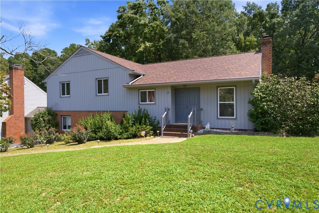 3231 Ludgate Road, Chester, VA 23831 Exterior featuring brick accents, light-colored siding, a front entry with steps, and an asphalt shingle roof