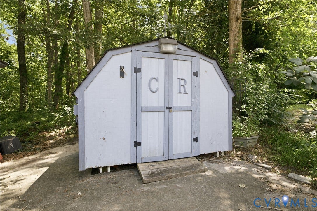 3231 Ludgate Road, Chester, VA 23831 Outdoor storage shed with a gambrel roof and double doors